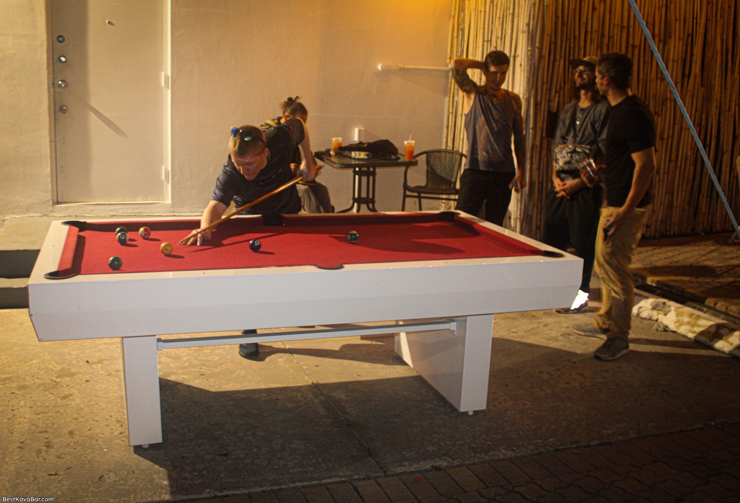 Guests playing pool at Zen Clarity