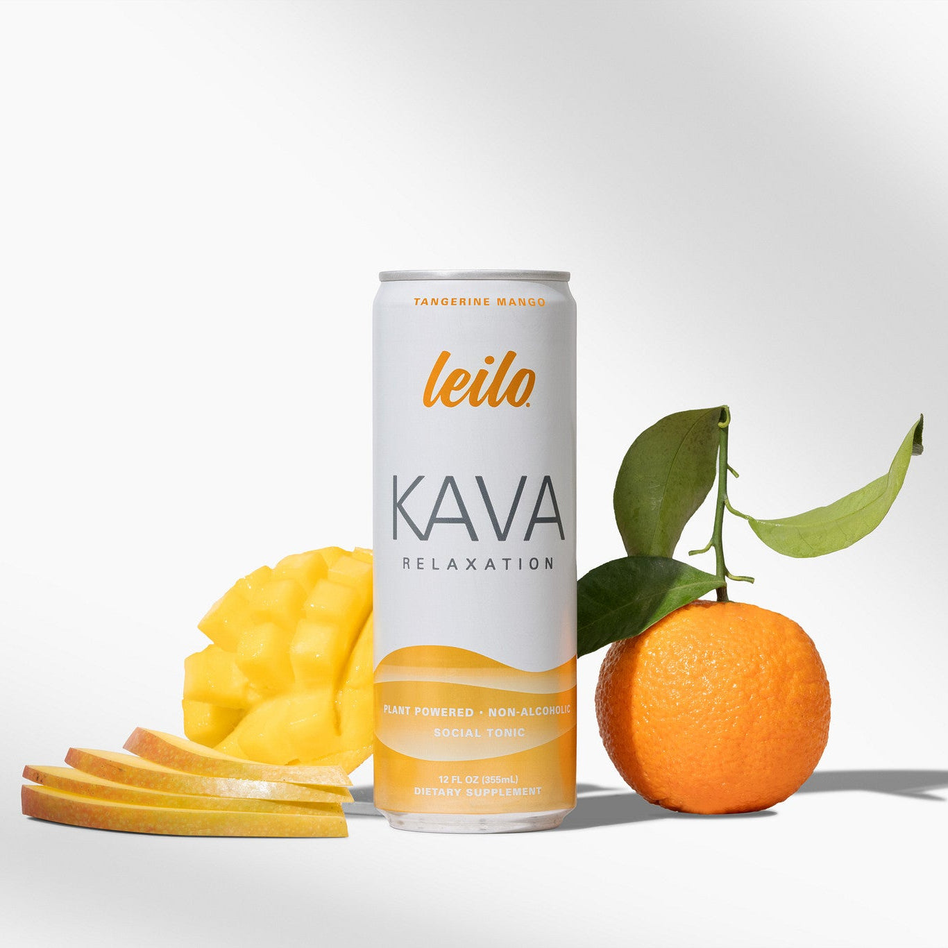 Leilo Tangerine Mango kava tonic can and glass over ice